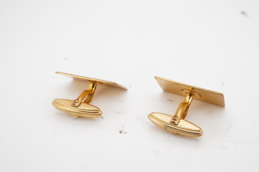 A pair of low carat gold cufflinks, the rectangular fronts with a brushed finish, each stamped 333, maker's mark, combined gross weight approximately 8 grams